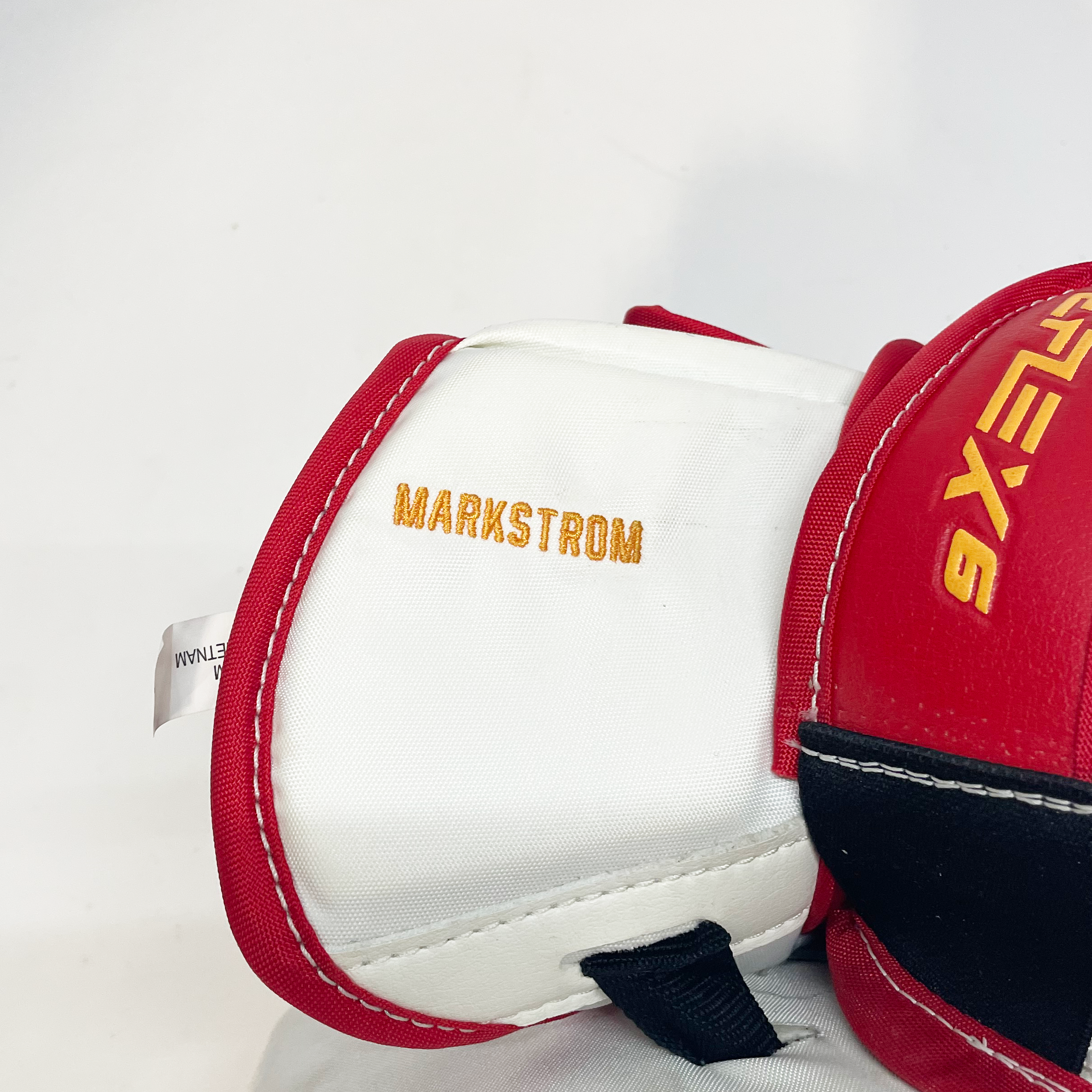 CCM Extreme Flex 6 - Gant de gardien de but professionnel de la LNH - Jacob Markstrom (blanc/rouge/jaune)
